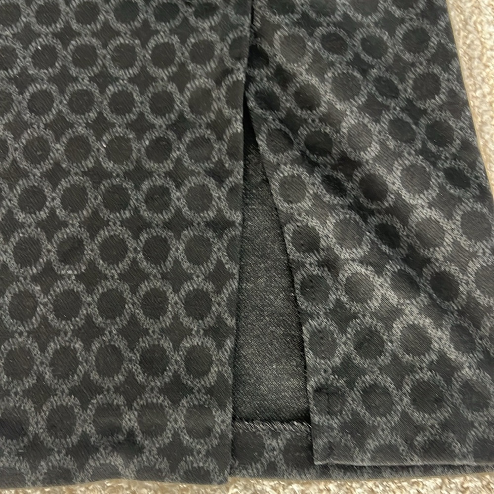Charcoal black stylish patterned Pencil skirt, hugs to curves. Elastic waist.